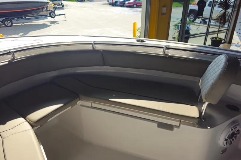 Slide: The Image of 2025 Sportsman Open 232 Center Console boat interior with cushioned seating and modern design. - 8