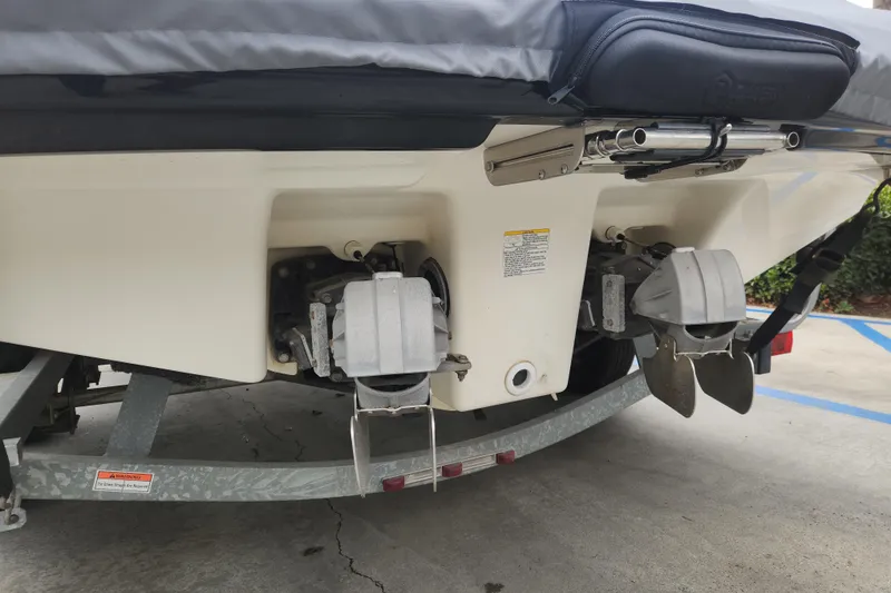 Slide: The Image of Rear view of a 2007 Yamaha Boats AR210 on a trailer, showing dual jet drives. - 3