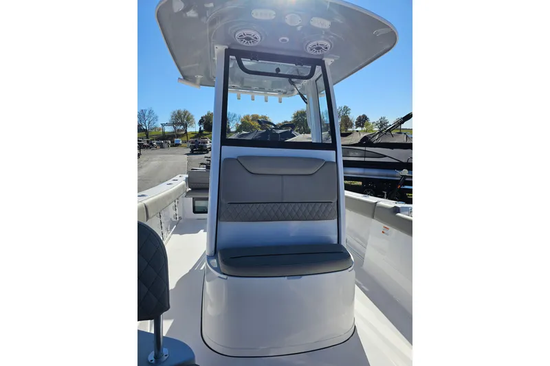Slide: The Image of 2025 Sportsman Heritage 231 Center Console boat with sleek seating and modern design. - 17