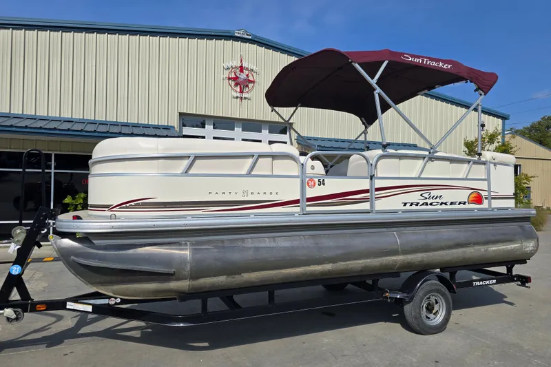 The Image of 2011 Sun Tracker Party Barge 21 Signature Series pontoon boat on trailer. - 0