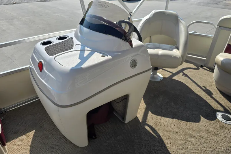 Slide: The Image of 2011 Sun Tracker Party Barge 21 Signature Series interior with helm and seating. - 15