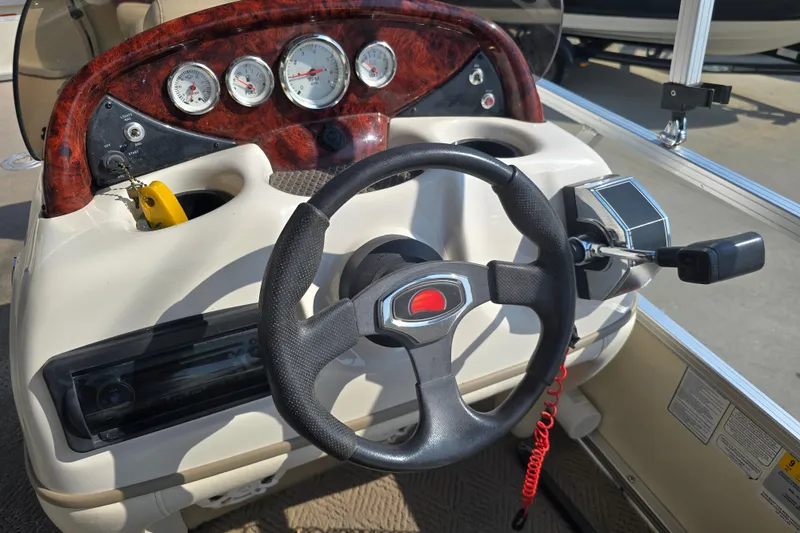 Slide: The Image of Steering console of 2011 Sun Tracker Party Barge 21 Signature Series pontoon boat. - 16