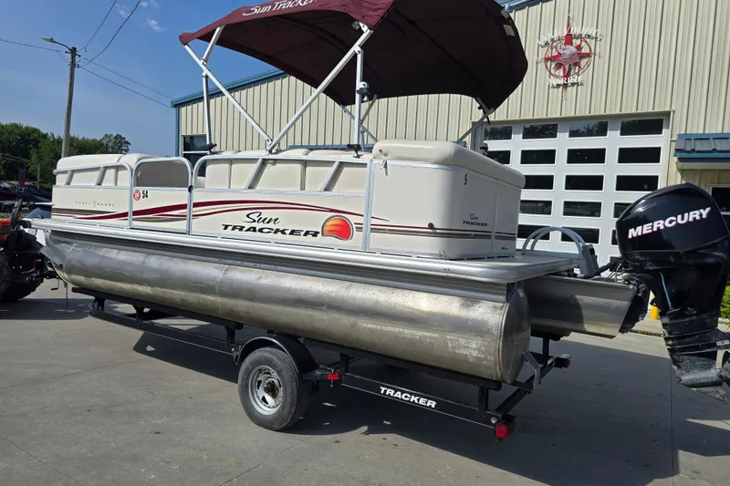 Slide: The Image of 2011 Sun Tracker Party Barge 21 Signature Series pontoon boat with Mercury outboard motor. - 3