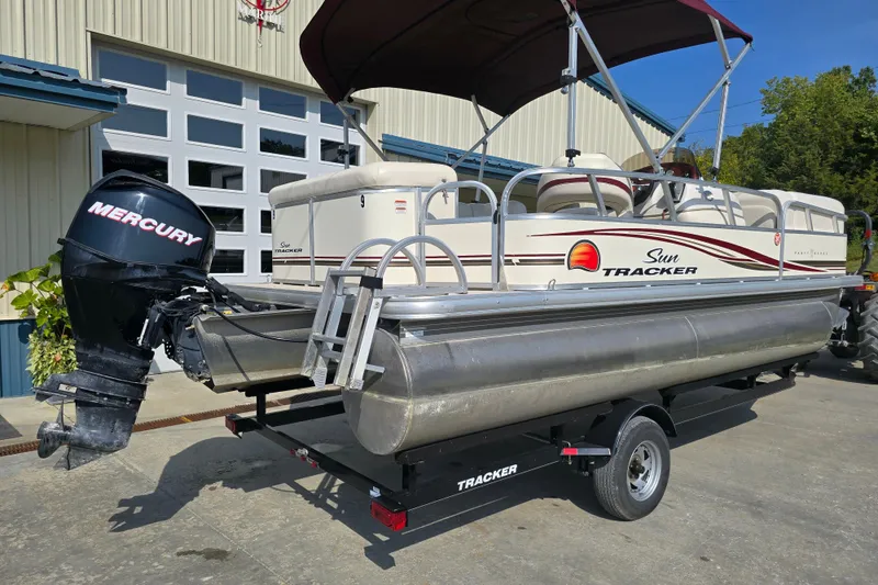 Slide: The Image of 2011 Sun Tracker Party Barge 21 Signature Series pontoon boat with Mercury outboard motor. - 5