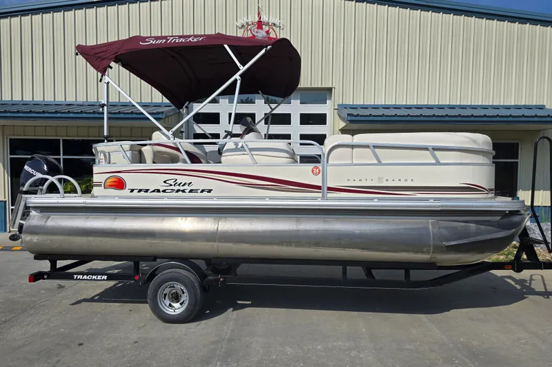 Slide: The Image of 2011 Sun Tracker Party Barge 21 Signature Series pontoon boat on trailer. - 6