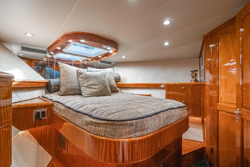 Slide: The Image of Luxurious 1991 Hatteras 58 Convertible yacht kitchen with sleek countertops and ample storage. - 20