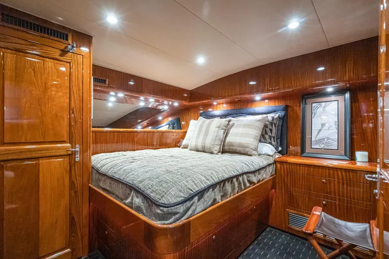 Slide: The Image of Luxury kitchen interior of 1991 Hatteras 58 Convertible yacht with wood cabinetry. - 24