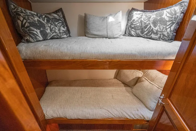 Slide: The Image of Glass cooktop in 1991 Hatteras 58 Convertible yacht kitchen, featuring wooden cabinetry. - 26