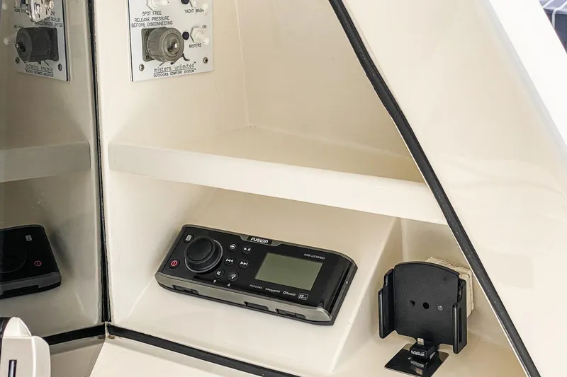 Slide: The Image of Luxurious bathroom interior of 1991 Hatteras 58 Convertible yacht with wood finishes. - 31