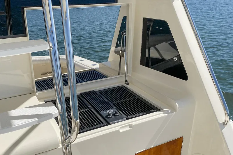 Slide: The Image of Luxurious bathroom and bedroom interior of 1991 Hatteras 58 Convertible yacht. - 32