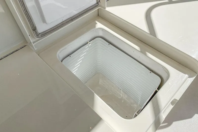 Slide: The Image of Luxurious cabin interior of 1991 Hatteras 58 Convertible yacht with elegant wood finish. - 33