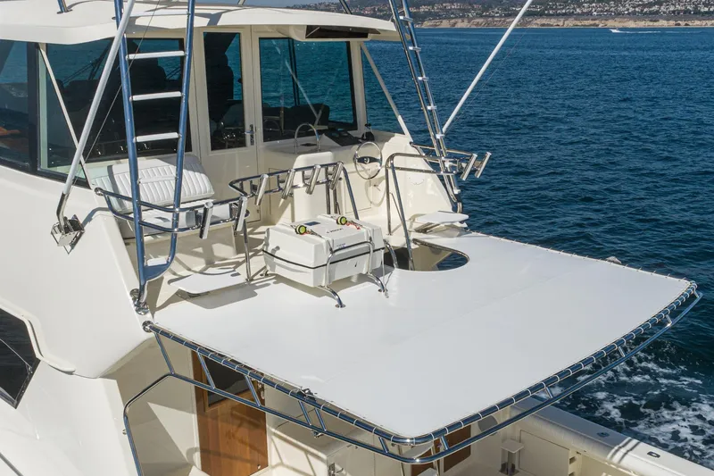 Slide: The Image of Bunk beds in 1991 Hatteras 58 Convertible yacht cabin with decorative pillows. - 37