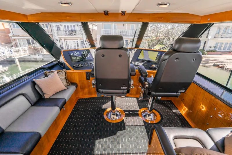 Slide: The Image of Luxurious bathroom interior of 1991 Hatteras 58 Convertible yacht with wood accents. - 38