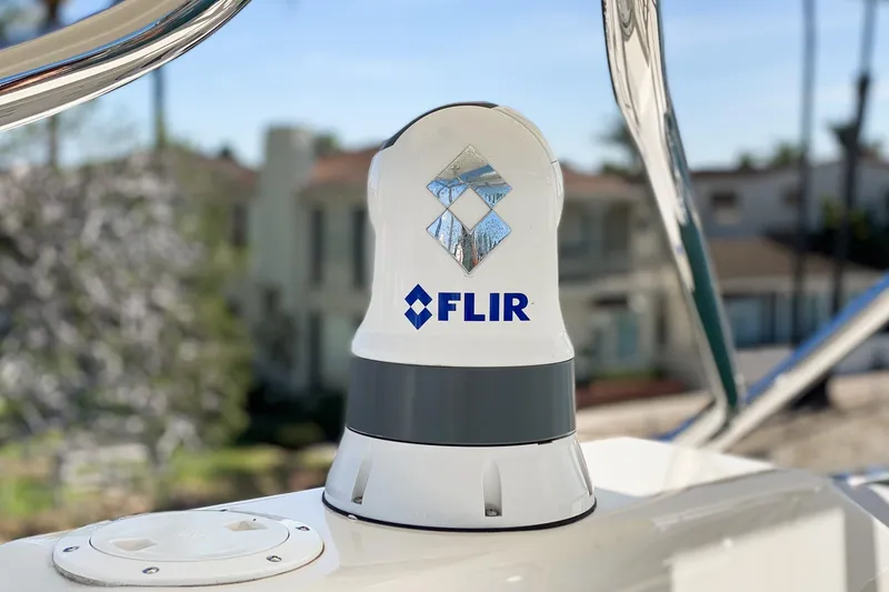 Slide: The Image of FLIR camera on 1991 Hatteras 58 Convertible yacht, showcasing advanced marine technology. - 49