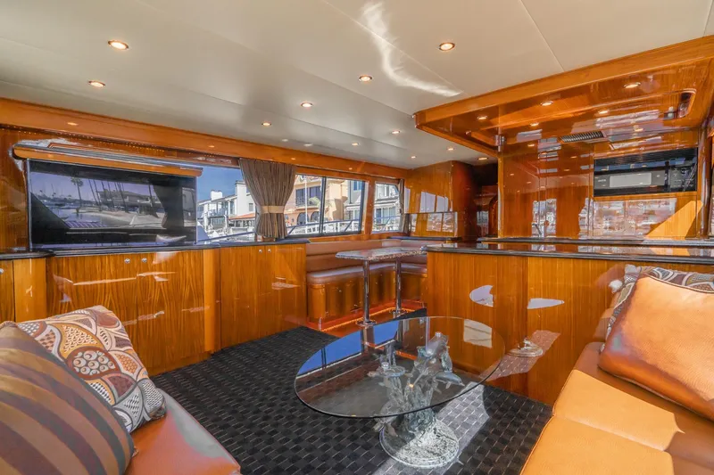 Slide: The Image of Luxurious interior of 1991 Hatteras 58 Convertible yacht with modern helm and seating. - 5