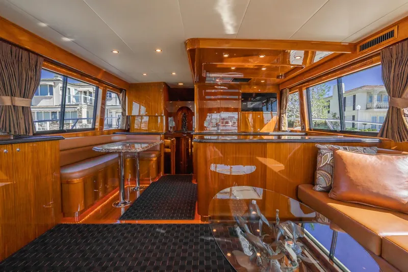 Slide: The Image of Cockpit of 1991 Hatteras 58 Convertible yacht with navigation screens and controls. - 6