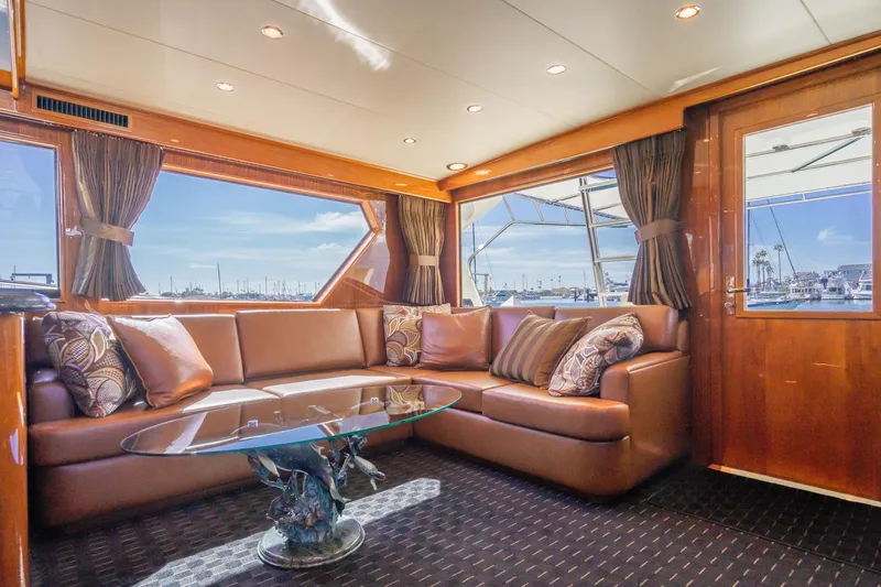 Slide: The Image of Cockpit of 1991 Hatteras 58 Convertible with Garmin navigation display and control panel. - 7