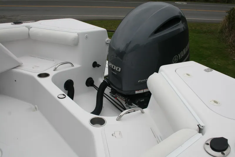 Slide: The Image of 2013 Pro-Line 20 Express boat with Yamaha 200 outboard motor, white interior. - 6