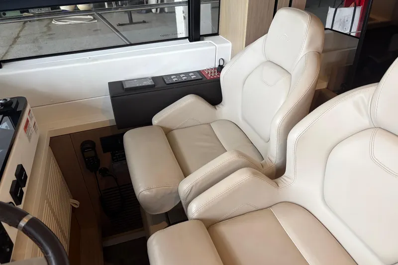 Slide: The Image of Luxurious interior seating of 2020 Azimut 55 yacht with beige leather upholstery. - 14