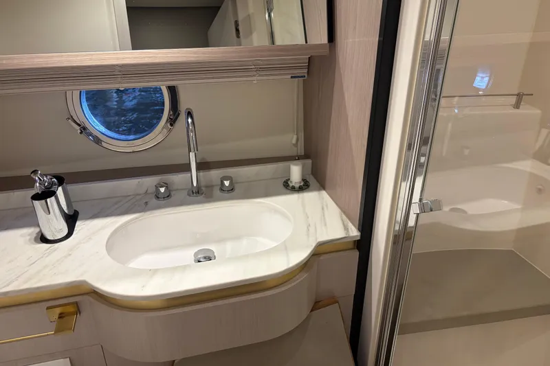 Slide: The Image of Luxurious bathroom in 2020 Azimut 55 yacht with marble sink and modern fixtures. - 19