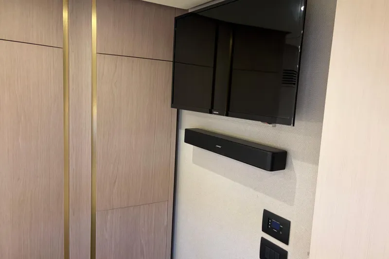 Slide: The Image of Interior of 2020 Azimut 55 yacht with mounted TV and soundbar. - 21