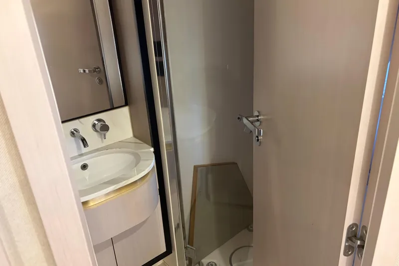 Slide: The Image of 2020 Azimut 55 yacht bathroom with modern sink and shower. - 23