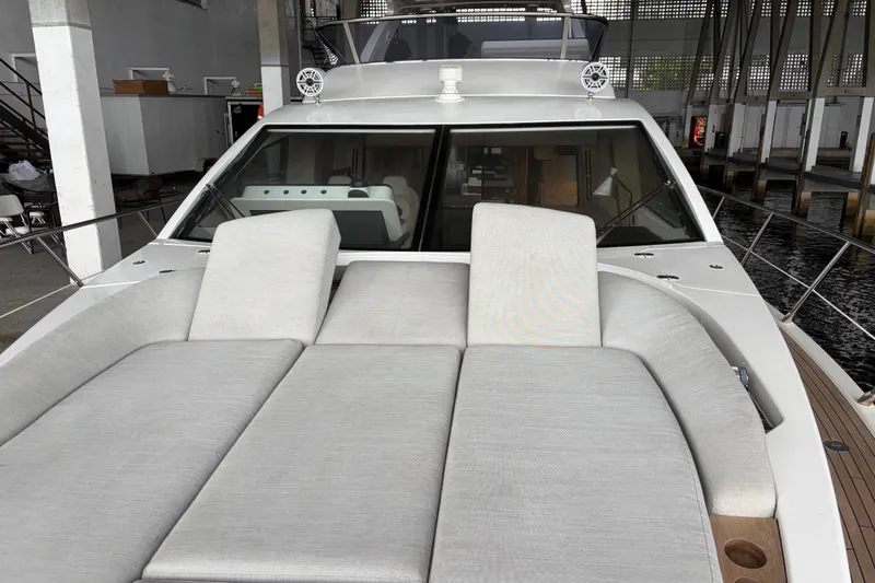 Slide: The Image of 2020 Azimut 55 yacht with luxurious sunbathing area and sleek design. - 4