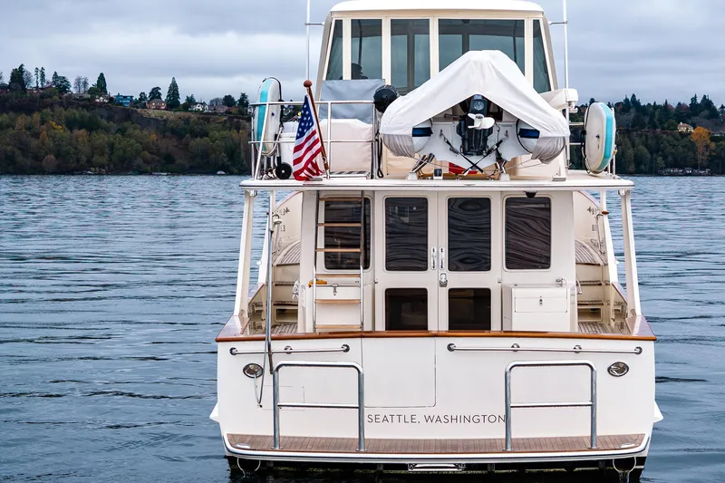 Slide: The Image of 2026 Fleming 55 Pilothouse yacht on water, Seattle, Washington, rear view. - 14