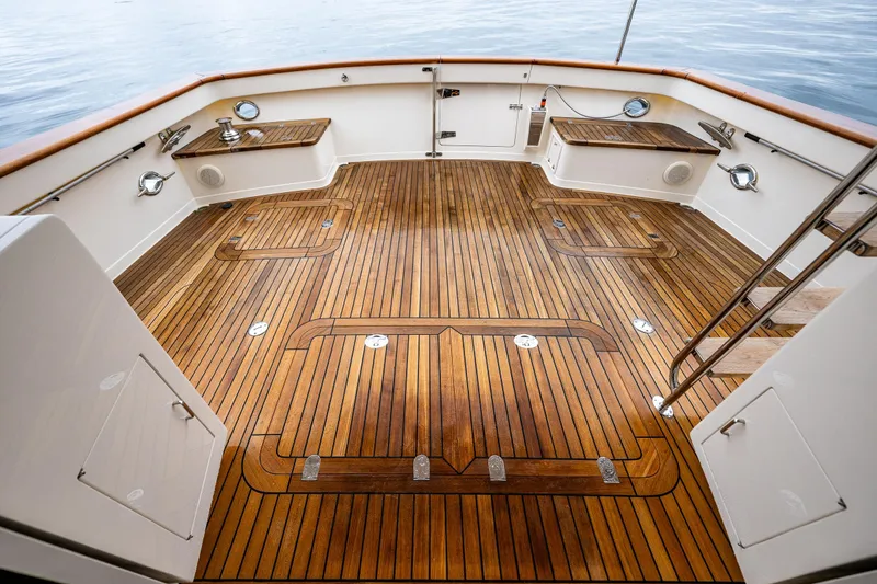 Slide: The Image of Luxurious teak deck of 2026 Fleming 55 Pilothouse yacht, featuring elegant wood finish. - 17
