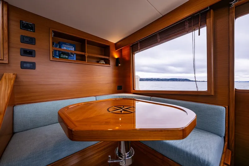 Slide: The Image of Luxurious interior of 2026 Fleming 55 Pilothouse yacht with ocean view. - 37