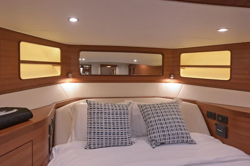 Slide: The Image of Luxurious bedroom in Fleming 55 Pilothouse 2027 yacht. - 48