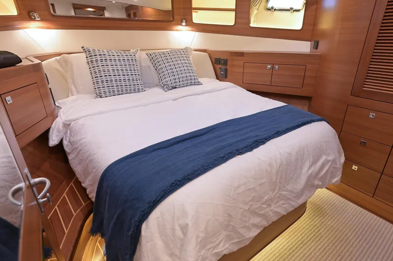 Slide: The Image of Luxurious bedroom in Fleming 55 Pilothouse 2027 yacht. - 49