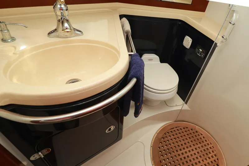 Slide: The Image of Luxurious bathroom in 2004 Chris-Craft Roamer 40 yacht with sink, toilet, and shower. - 46