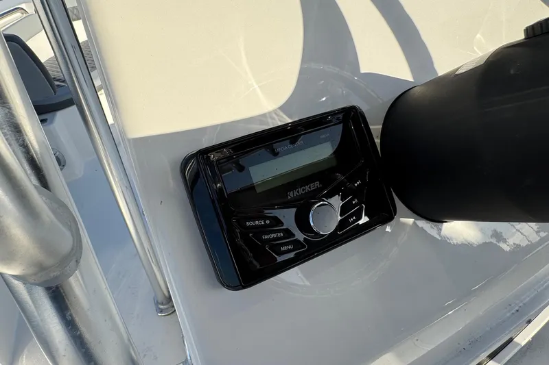 Slide: The Image of Kicker media center on 2025 Defiance Catalina 240 boat dashboard. - 31
