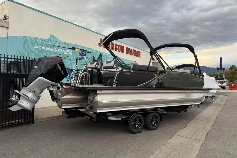 The Image of 2026 Avalon 2385 LSZ QLS pontoon boat on trailer at Johnson Marine dealership. - 0