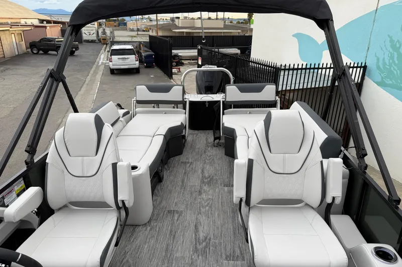 Slide: The Image of 2026 Avalon 2385 LSZ QLS pontoon boat interior with luxurious seating and modern design. - 4