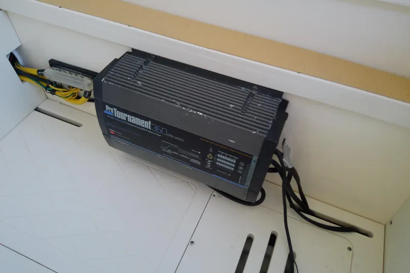 Slide: The Image of Battery charger in a 2018 Scout 251 XSS boat, featuring Pro Tournament 360 Elite Series. - 58