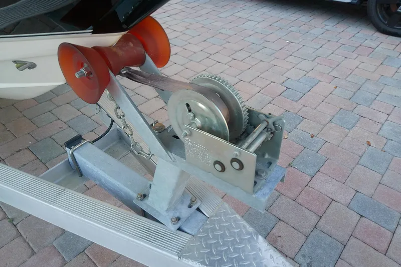 Slide: The Image of Boat trailer winch system for 2018 Scout 251 XSS on paved surface. - 65