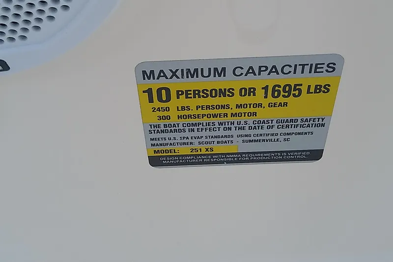 Slide: The Image of Capacity label for 2018 Scout 251 XSS boat, 10 persons or 1695 lbs. - 67