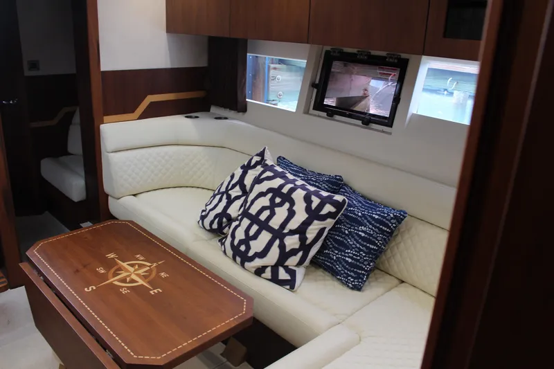 Slide: The Image of Luxurious interior of 2017 Galeon 385 HTS yacht with plush seating and nautical decor. - 11