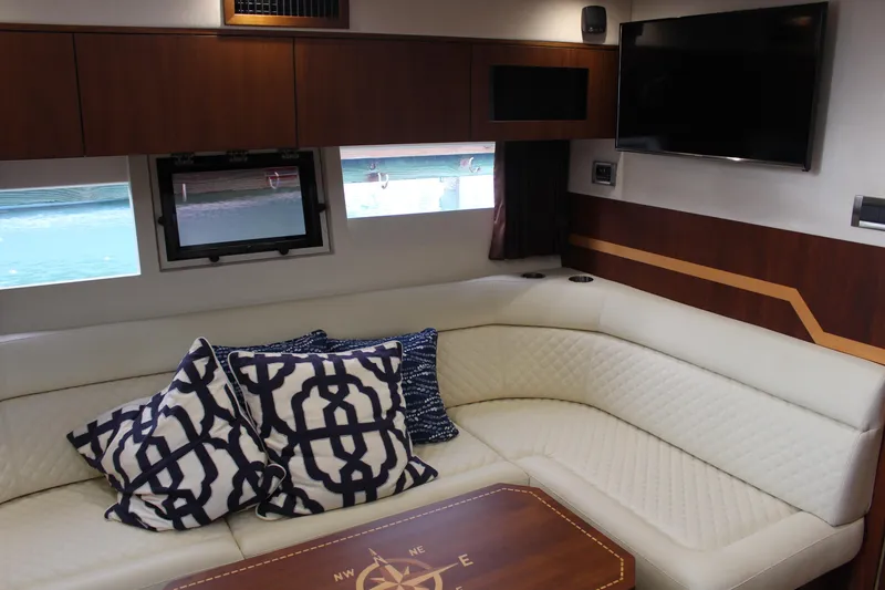 Slide: The Image of Luxurious interior of 2017 Galeon 385 HTS yacht with plush seating and nautical decor. - 14