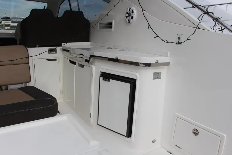 Slide: The Image of Interior of 2017 Galeon 385 HTS yacht with seating and kitchenette area. - 3