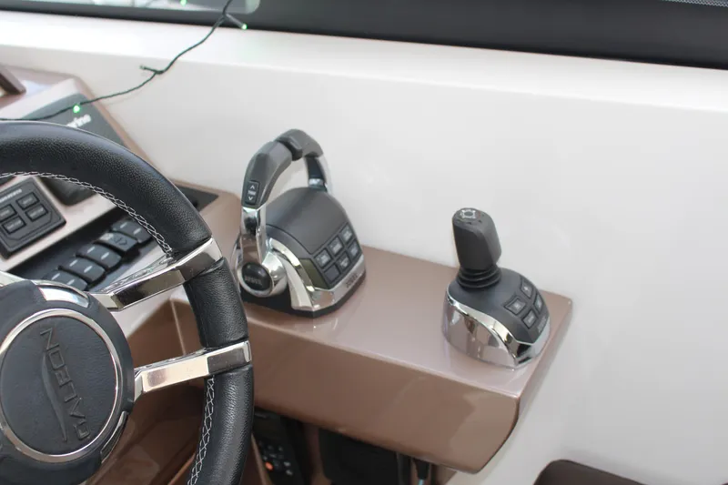 Slide: The Image of Steering wheel and controls of 2017 Galeon 385 HTS yacht cockpit. - 5