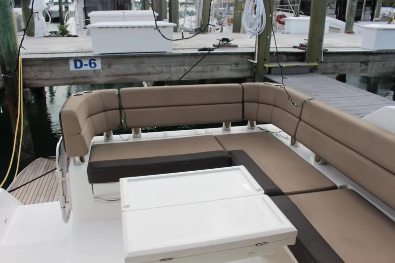 Slide: The Image of Luxurious seating area on a 2017 Galeon 385 HTS yacht at a marina. - 7