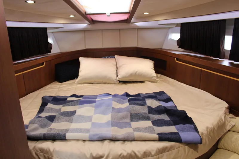 Slide: The Image of Luxurious cabin interior of 2017 Galeon 385 HTS yacht with cozy bedding. - 8