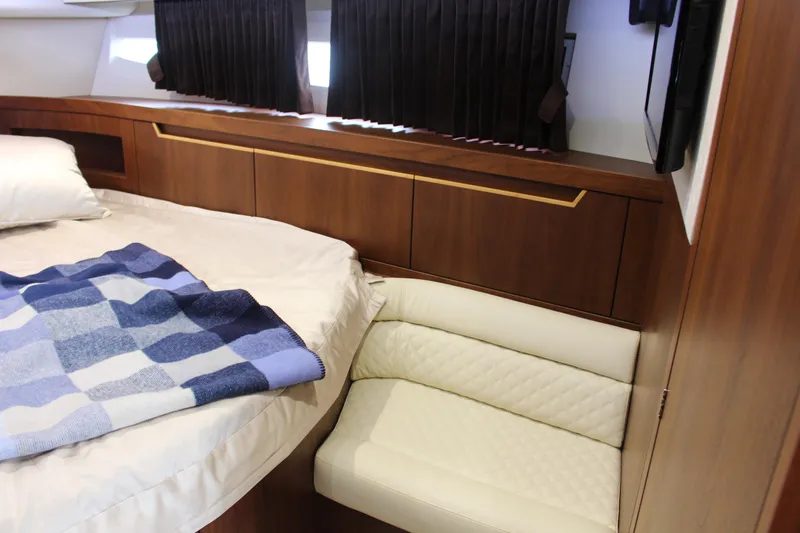 Slide: The Image of Luxurious interior of 2017 Galeon 385 HTS yacht with cozy bed and seating area. - 9