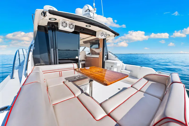 Slide: The Image of Luxurious 2016 Sea Ray 510 Sundancer yacht with elegant seating and ocean view. - 37