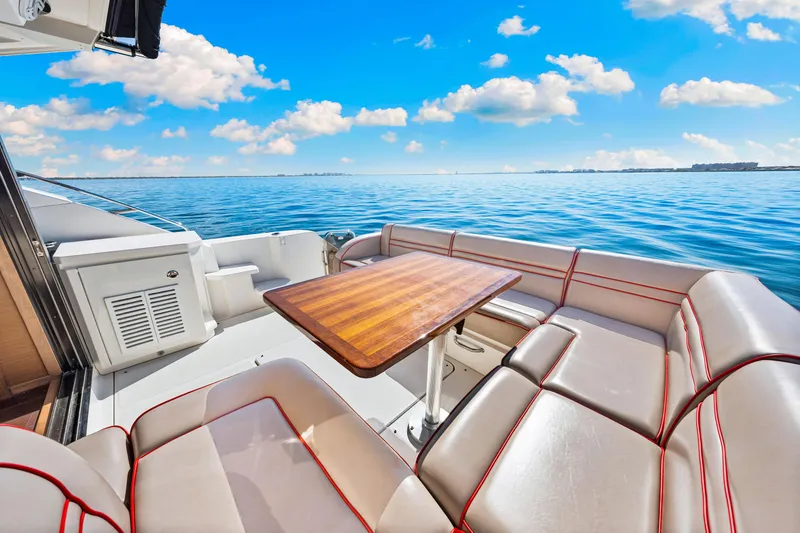 Slide: The Image of Luxurious 2016 Sea Ray 510 Sundancer yacht with elegant seating and ocean view. - 39