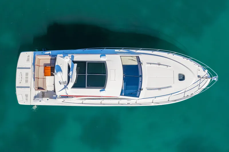 Slide: The Image of Aerial view of 2016 Sea Ray 510 Sundancer yacht on clear turquoise water. - 4