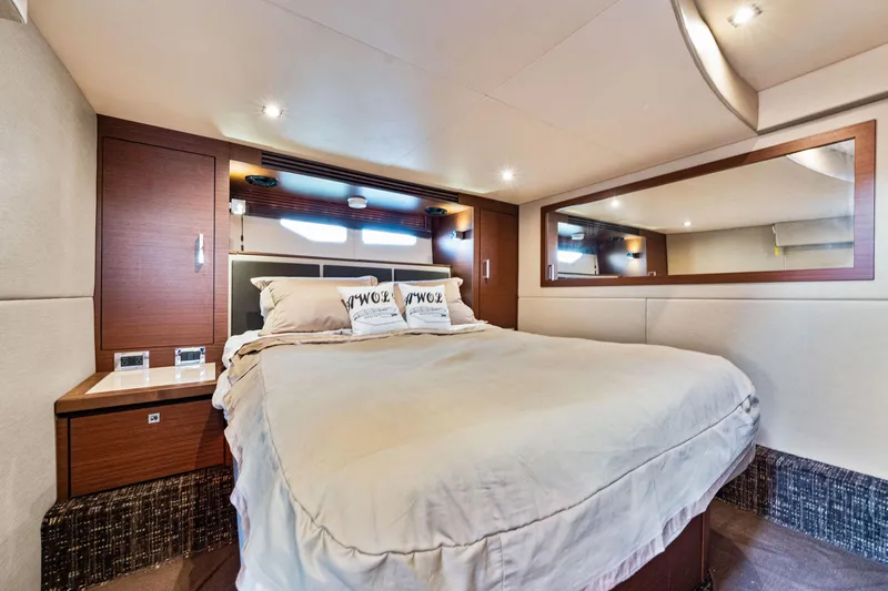 Slide: The Image of Luxurious bedroom interior of 2016 Sea Ray 510 Sundancer yacht with elegant bedding. - 64